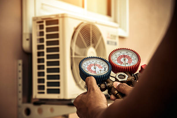 Professional Air Conditioning Service technician working in Cincinnatus, NY